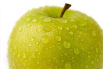 Green apple on the white background