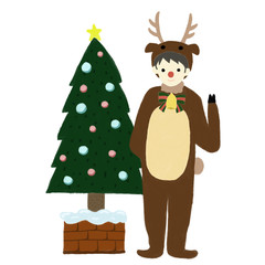 クリスマスツリーとトナカイ仮装の男の子