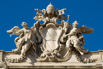 Sculpture on the roof. Fountain Trevi. Rome. Italy