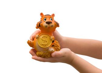 Figure of a tiger in children's hands.