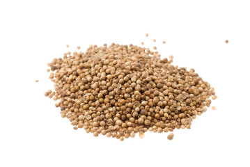 Heap of coriander seeds isolated on white