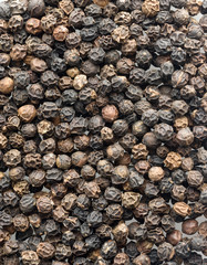 close-up of black peppercorns