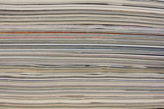 stack of colorful magazines - background