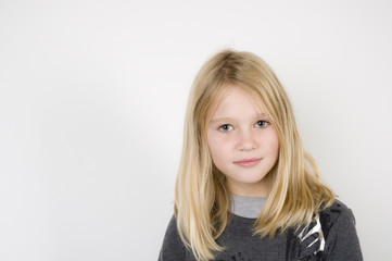 Naklejka premium Young girl with blond sheds