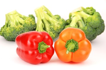 Isolated broccoli and colorful pepper
