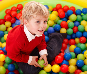 Fototapeta na wymiar Happy birthday of boy in color balls.