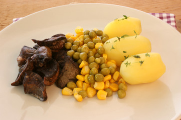 lung goulash on potato and organic vegetables