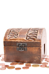 A wooden ancient chest full of money..