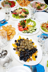 Table served with lots of appetizers with selective focus