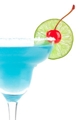 Blue cocktail with cherry and lime slice
