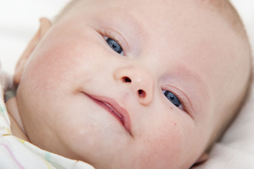 Cute baby boy close up