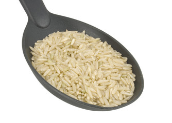 rice on black plastic spoon isolated on white background