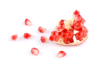 Pomegranate grains on a white background