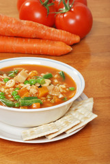 vegetable soup with crackers fresh carrots tomato