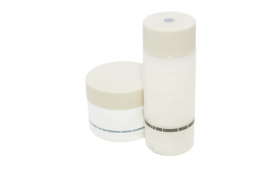 Cosmetic/lotion bottles on white with clipping path