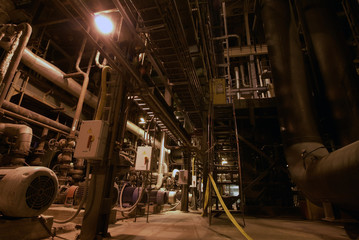 Pipes, tubes, machinery and steam turbine at a power plant