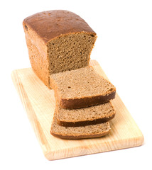 Brown bread on cutting board isolated on white