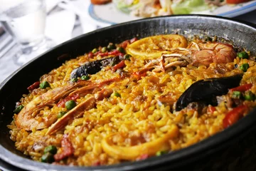 Fotobehang Paellea, traditional spanish food © Cristian Ciobanu