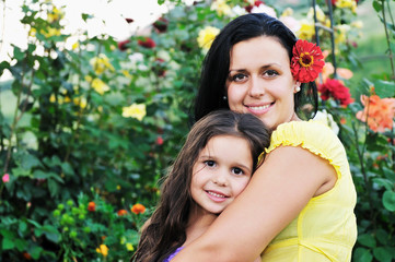Fototapeta premium happy mom and daughter outdoor