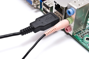 Cables plugged into connector on computer motherboard