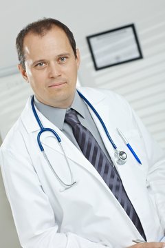 Portrait of middle-aged male doctor