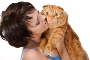 cat at the hands of hostess