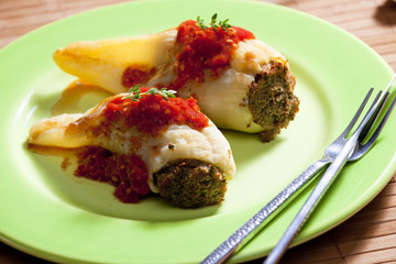 peppers filled with smoked meat with tomato sauce