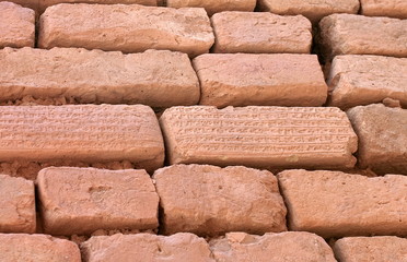 Brick wall with cuneiform writing. Shoqa Zanbil, Shush, Iran
