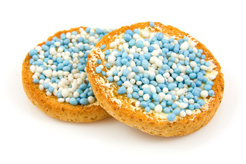 Rusk with blue mice over white background