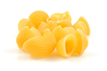 raw pasta noodles over white