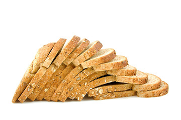 standing slices of bread are falling over white background