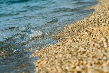 Small wave and sand.