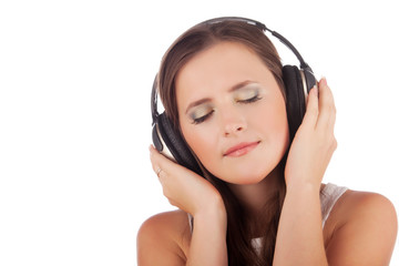 Young woman enjoyment and relaxation music in headphones