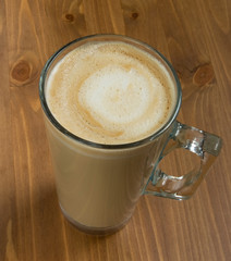 cafe latte glass on wooden table