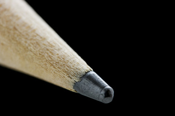 Tip of pencil over black with shallow DOF