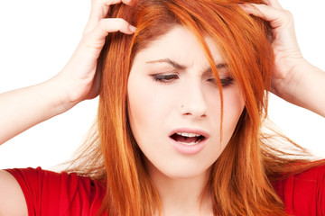 unhappy redhead woman