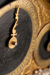 Detail of historic clock, gold and black