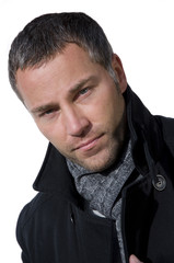 Fototapeta premium Junger Mann mit Jacke und Schal