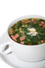ssian kvass soup with chopped vegetables and meat isolated on wh
