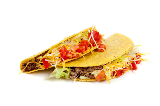 Two tacos on a white background
