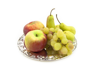 Grapes, apples and pears on a silver dish