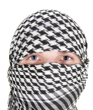 Close up of man in keffiyeh against white background