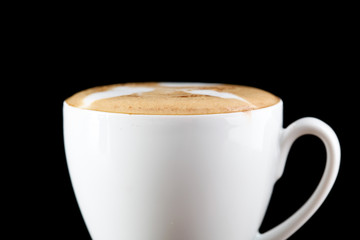art latte on a cappuccino coffee cup