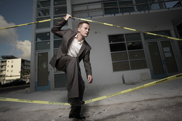 Businessman leaving a construction site