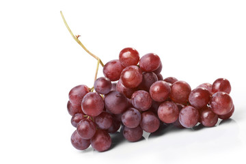 Red ripe grape on the white background