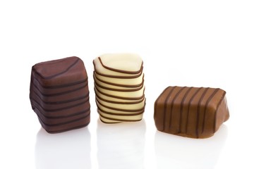 Belgian chocolates on a white background