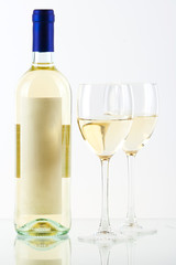 Bottle of white wine and two wine glasses