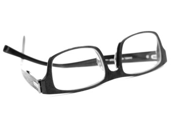 Black reading glasses isolated on white