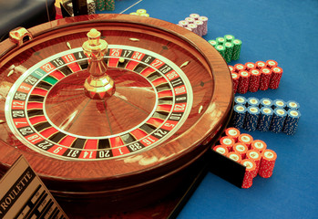 roulette table in casino with chips close-up