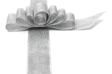 silver gift ribbon and bow isolated over white